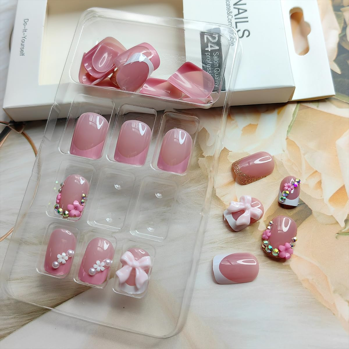 24Pcs Pink Press on Nails Short Square Fake Nails French Tip Press Ons with Flower Bow Charms Design Acrylic False Nails Glitter Rhinestone Glue on Nails Glossy Artificial Stick on Nails Kit for Women
